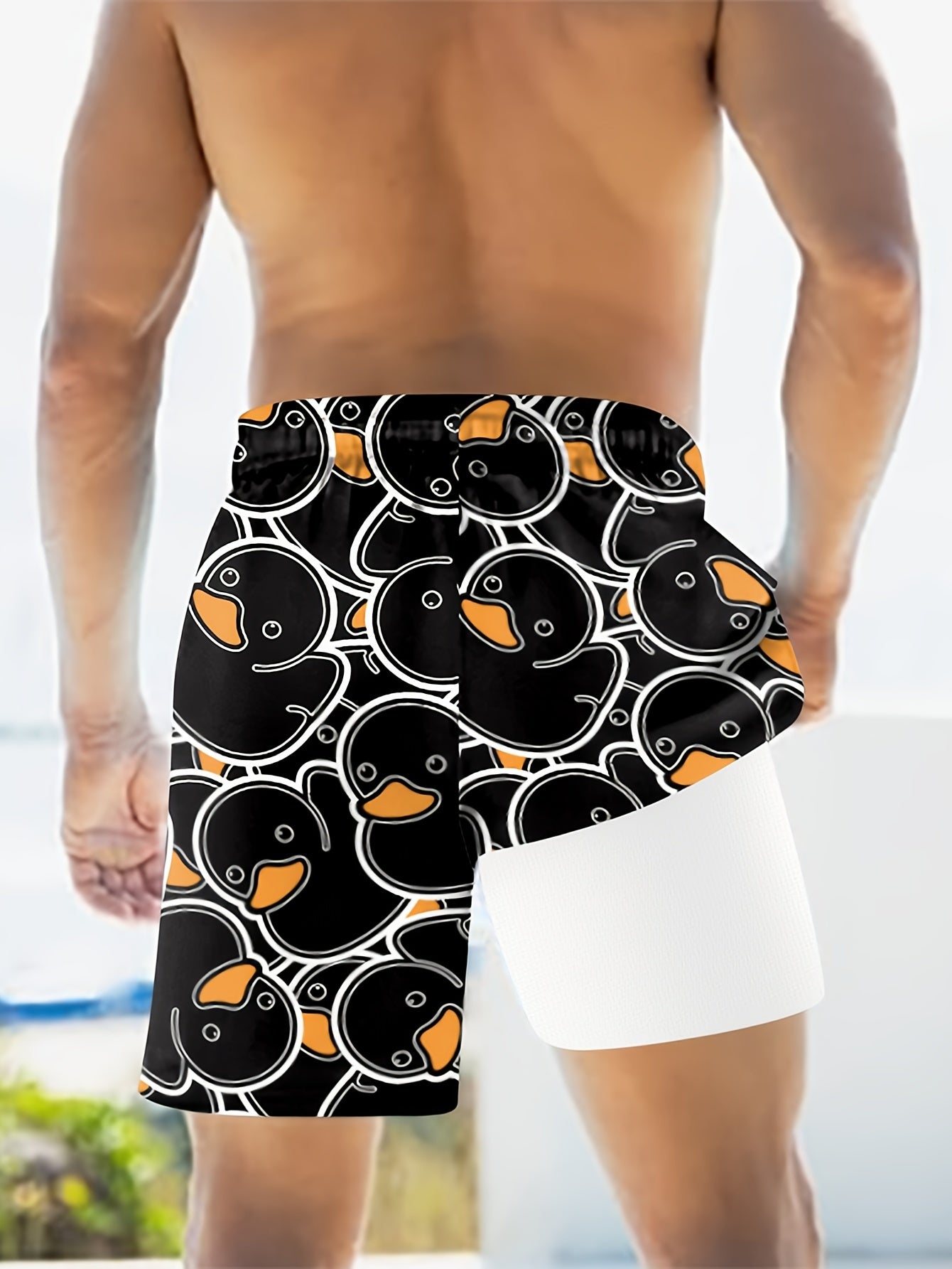 Herrars badshorts med roliga ankan-motiv – perfekt för strand och pool