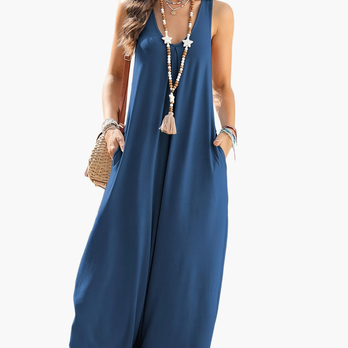 Dam Jumpsuit med V-ringning och Vida Ben – Elegant och Avslappnad Sommardräkt