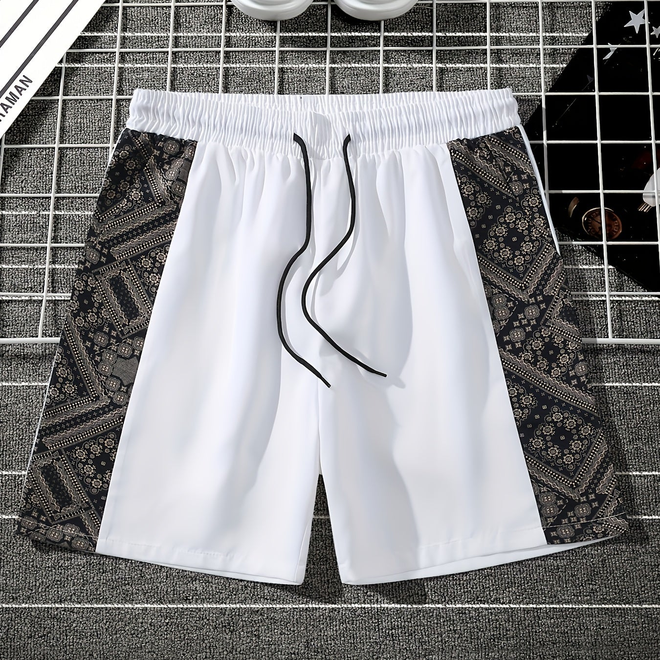 Herrshorts med grafiskt mönster och avslappnad streetwear-stil för vardagsbruk