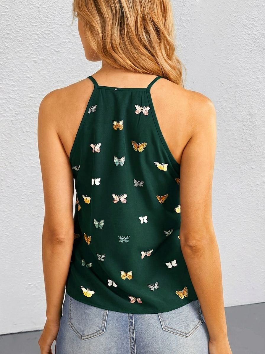 Damlinne med fjärilsmönster och halterneck – Elegant sommartopp