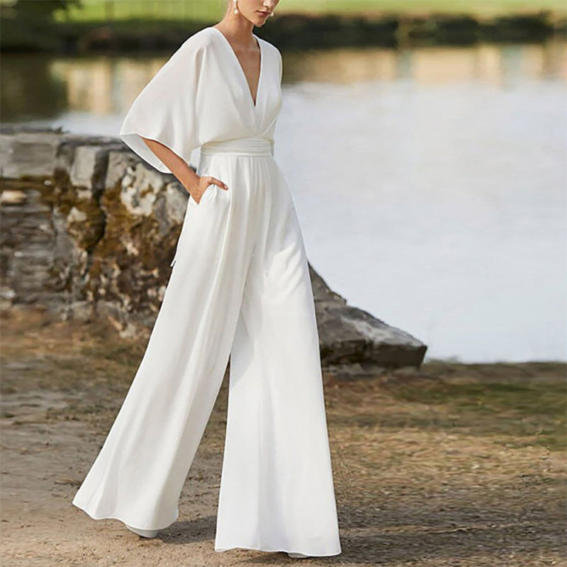 Rebecca – Klänning Jumpsuit med Djup V-hals och Hög Midja