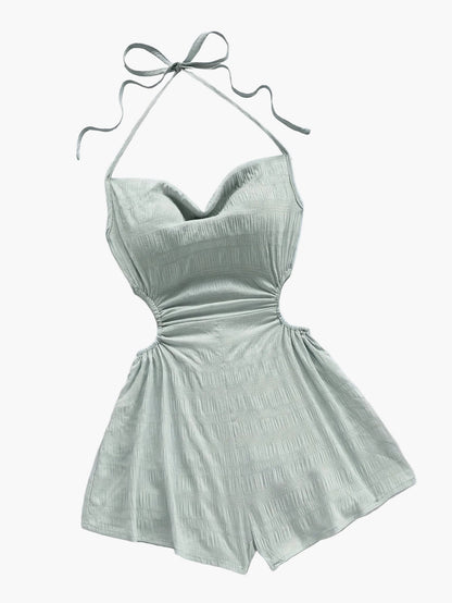 Dam Playsuit med Halterneck och Cut-Out – Trendig Sommarstil för Semester och Strand
