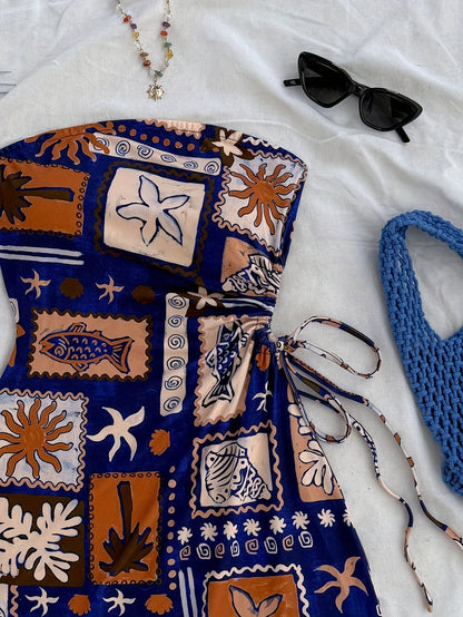 Dam Strandklänning Med Bandeau-Design Och Tropiska Motiv – Perfekt För Semester Och Sommar