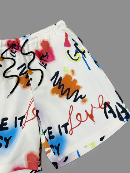 Herrshorts med graffiti-tryck och streetwear-stil för avslappnad vardag och strand
