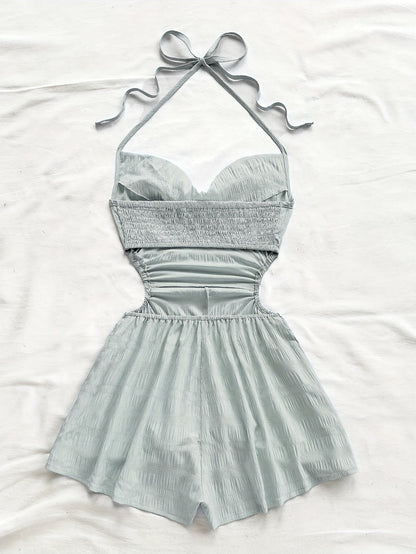 Dam Playsuit med Halterneck och Cut-Out – Trendig Sommarstil för Semester och Strand
