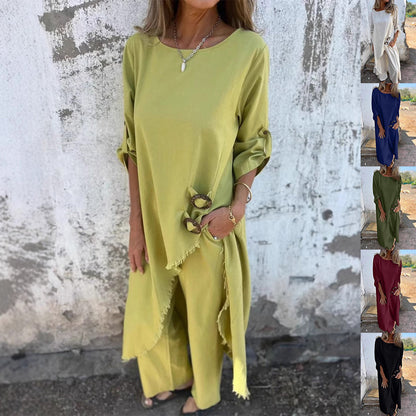 Imogen – Lång kostym med metallknappdesign och rund hals, långärmad topp och raka byxor