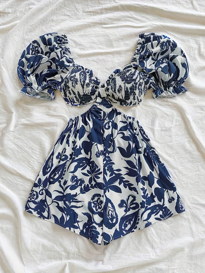 Dam Playsuit med Tropiskt Bladmönster och Puffärmar – Perfekt för Sommar och Semester