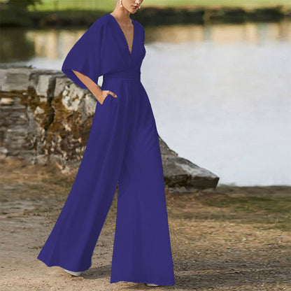 Rebecca – Klänning Jumpsuit med Djup V-hals och Hög Midja