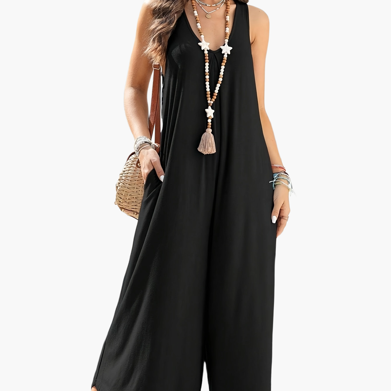 Dam Jumpsuit med V-ringning och Vida Ben – Elegant och Avslappnad Sommardräkt