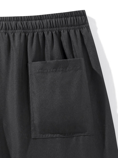Herrar Sportshorts med Dragkedjefickor – Lösa Träningsshorts för Aktiva