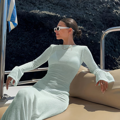Damers maxiklänning med lång ärm och elegant strandstil – perfekt för semester, båt och pool