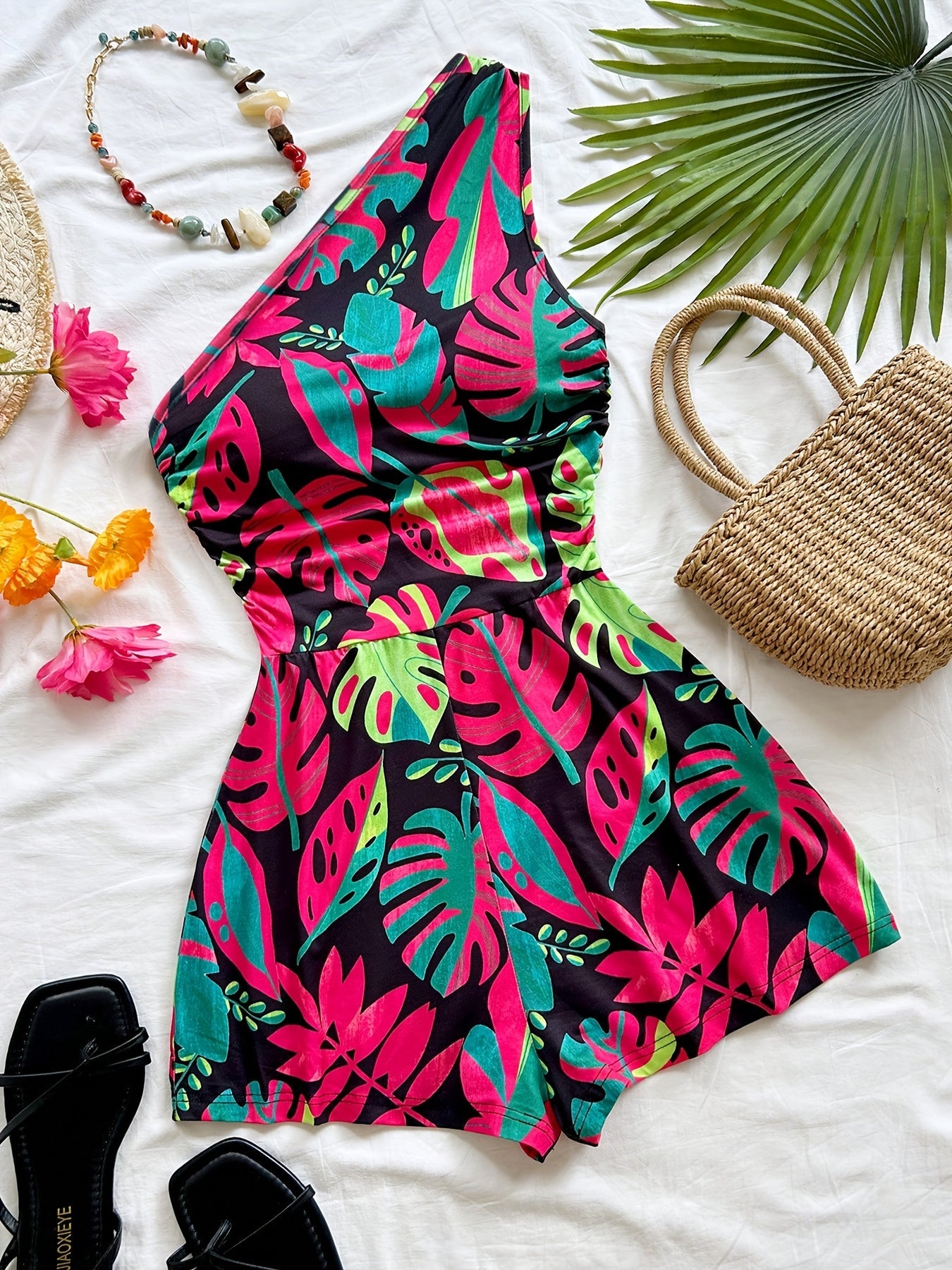 Dam Playsuit med Tropiskt Mönster och Asymmetrisk Enaxlad Design – Sommar, Fest och Semester