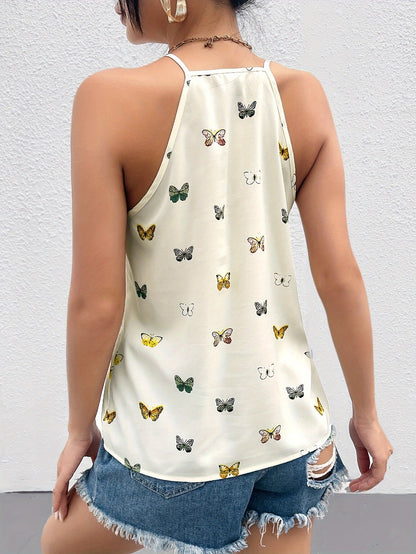 Damlinne med fjärilsmönster och halterneck – Elegant sommartopp