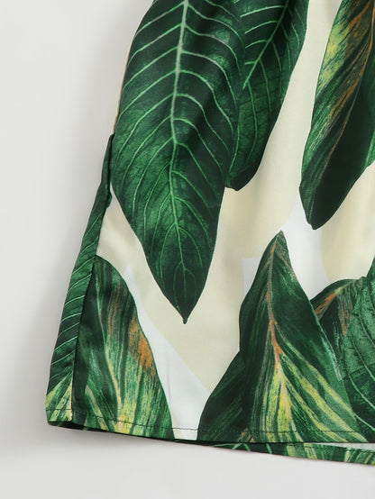 Dam Playsuit Tropisk Bladmönster – Somrig Kort Jumpsuit för Semester och Strand