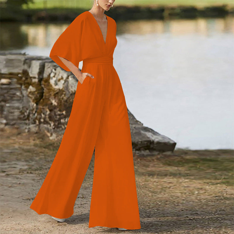 Rebecca – Klänning Jumpsuit med Djup V-hals och Hög Midja