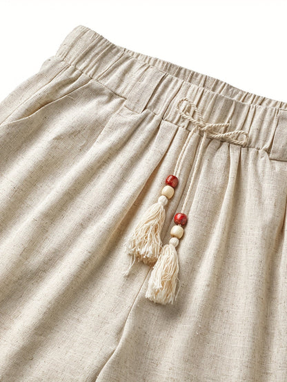 Herrshorts med bohemisk dragsko och tofs – avslappnad sommarstil för semester och strand