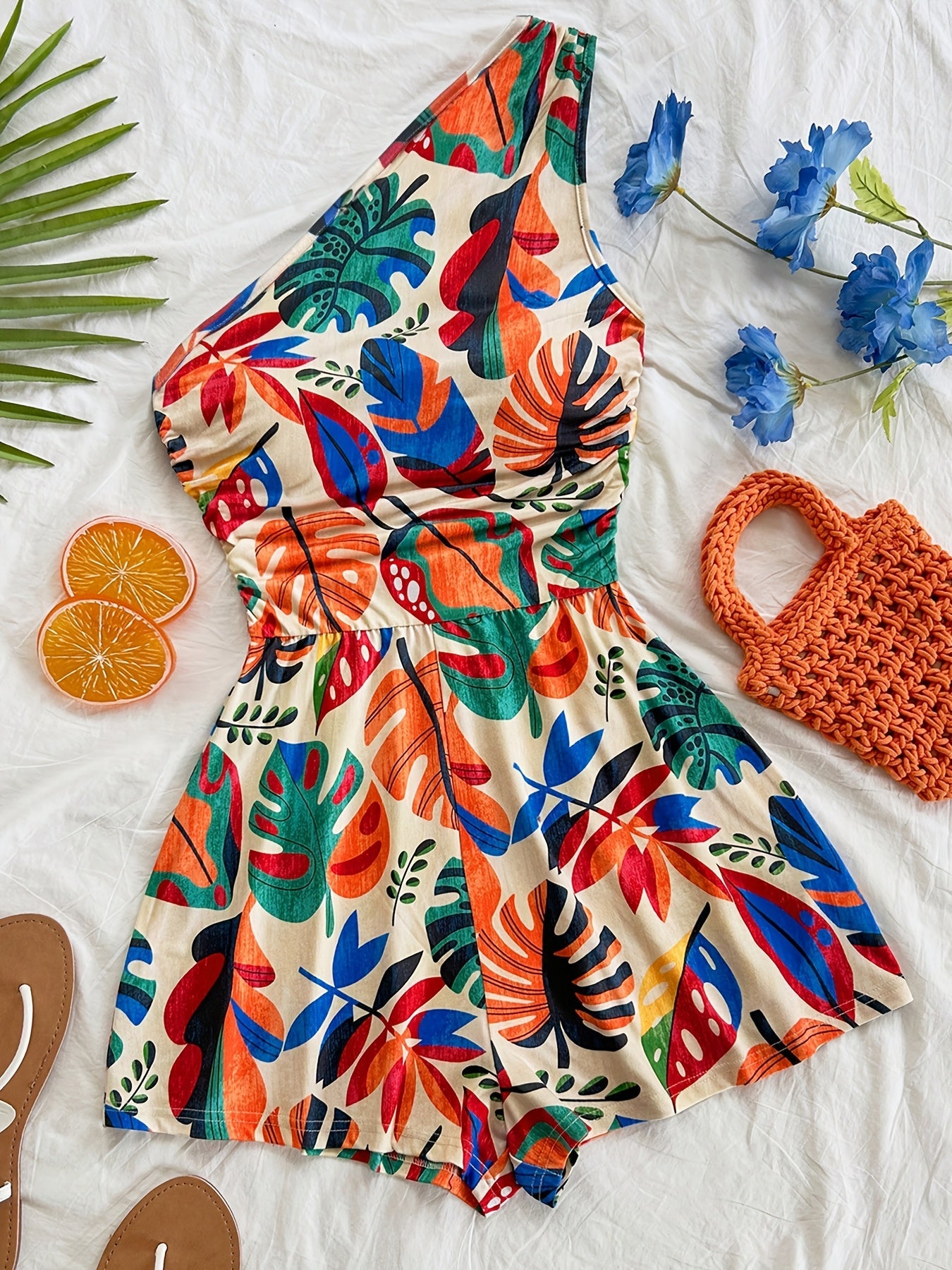 Dam Playsuit med Tropiskt Mönster och Asymmetrisk Enaxlad Design – Sommar, Fest och Semester