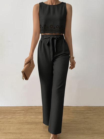 Damset med broderad topp och vida byxor – Elegant vår- och sommaroutfit