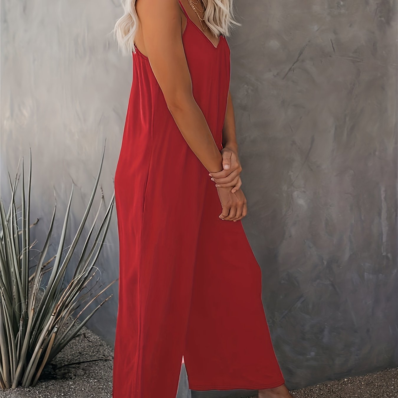 Dam Jumpsuit med Spaghettiband och Fickor – Avslappnad och Trendig Sommarstil