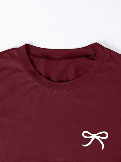 Dam T-shirt med rosettbroderi, vardagsstil, smickrande passform