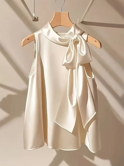 Damtop Elegant Ärmös med Rosettdetalj för Fest och Kvällsbruk