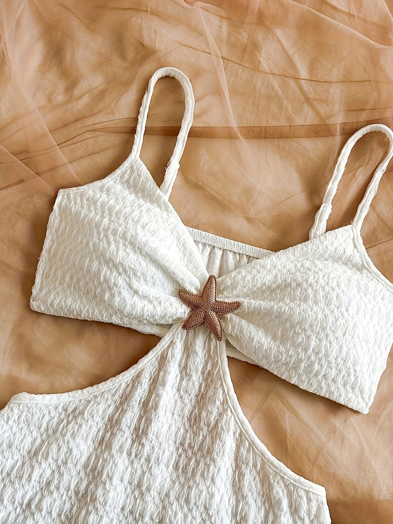 Damernas strandklänning bodycon miniklänning med utskärning och sjöstjärne-detalj – perfekt för semester och sommarfester