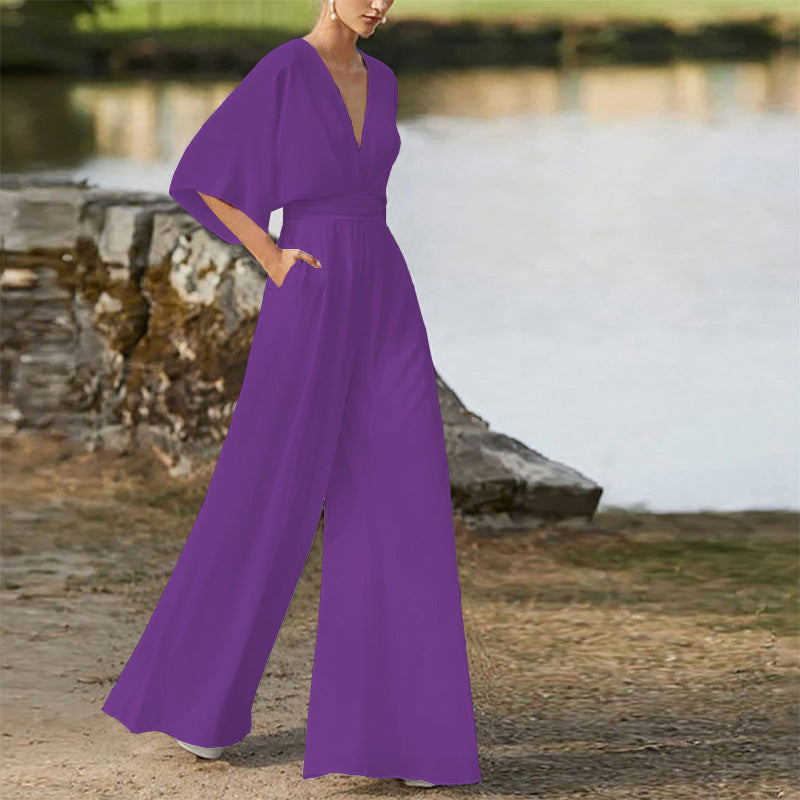 Rebecca – Klänning Jumpsuit med Djup V-hals och Hög Midja