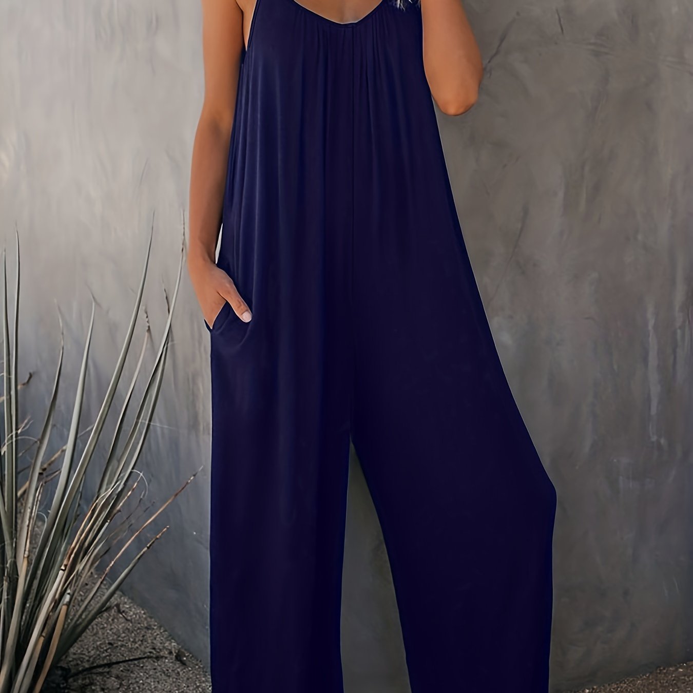 Dam Jumpsuit med Spaghettiband och Fickor – Avslappnad och Trendig Sommarstil