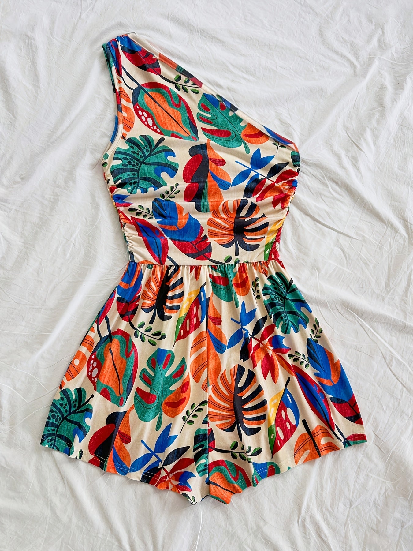 Dam Playsuit med Tropiskt Mönster och Asymmetrisk Enaxlad Design – Sommar, Fest och Semester
