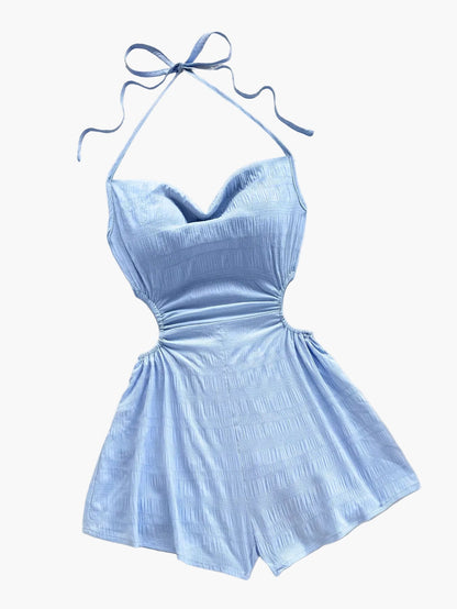 Dam Playsuit med Halterneck och Cut-Out – Trendig Sommarstil för Semester och Strand