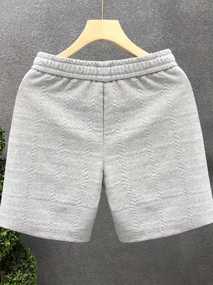 Herrshorts med Präglat Rutmönster – Modern Sportig Stil för Fritid och Träning