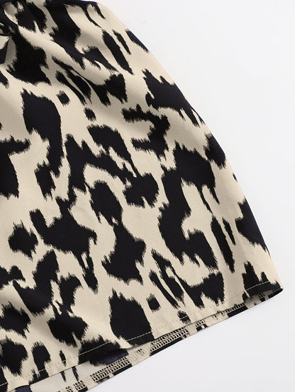 Dam Set Trendigt Asymmetriskt Linne och Shorts med Djurmönster – Perfekt för Sommar och Fritid