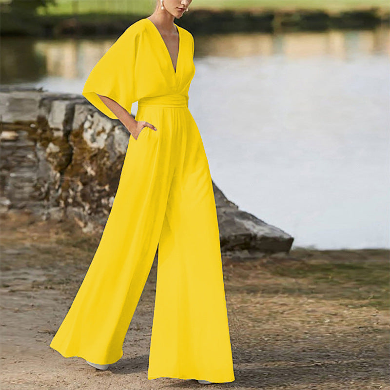 Rebecca – Klänning Jumpsuit med Djup V-hals och Hög Midja