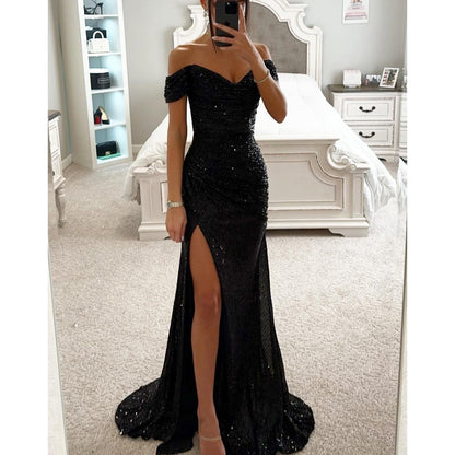 Somrig glittrig festklänning dam – elegant off shoulder långklänning för sommarbröllop och fest