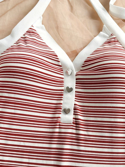 Damers eleganta randiga sommarplaysuit med knytdetalj och v-ringning – perfekt för semester och strand