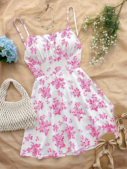 Damklänning med blommigt mönster och smala axelband – Elegant sommarklänning för fest och vardag