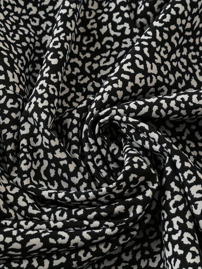 Dam Topp i Leopardmönster med Volangärm – Ledig Semesterstil
