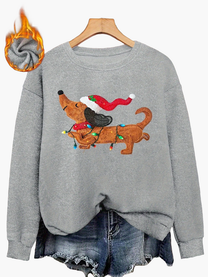 Damtröja med julmotiv och tax – julig och avslappnad stickad pullover